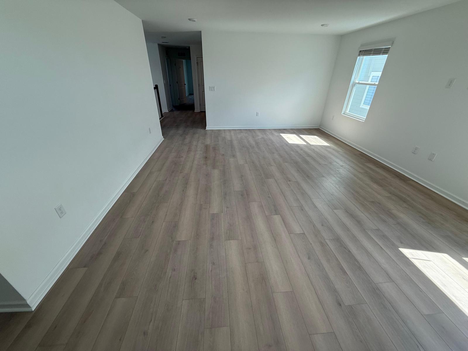 Luxury vinyl plank flooring installed in a leasing office